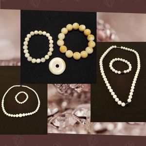 set of hand carved tridacna necklaces and bracelet